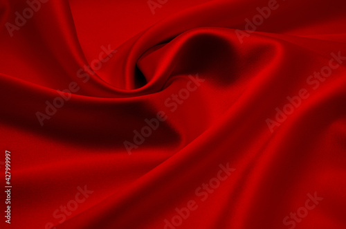 red satin fabric as background