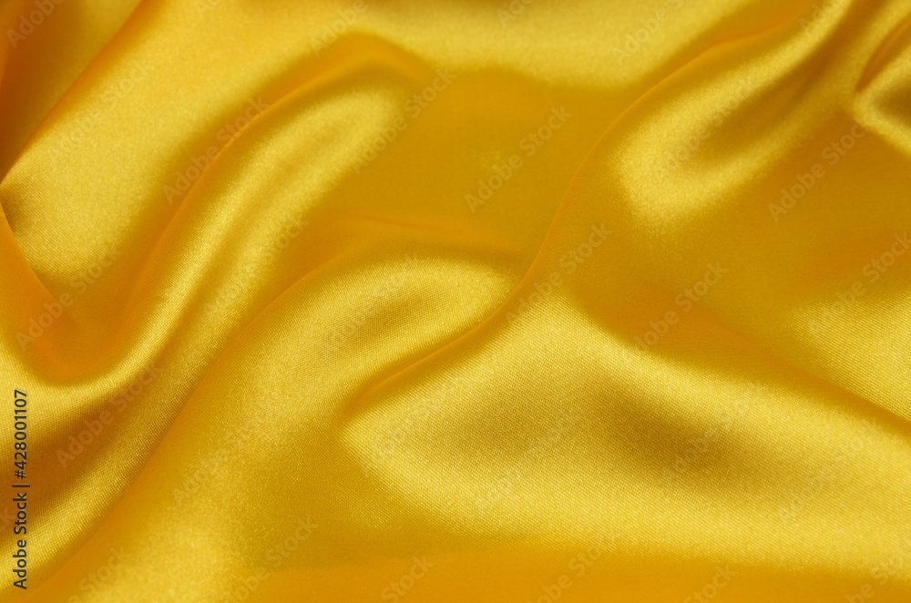 yellow satin fabric as background yellow satin fabric as background