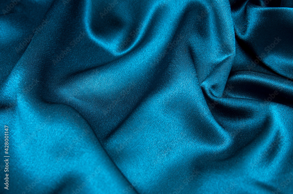 Fototapeta premium Smooth elegant blue silk can use as background
