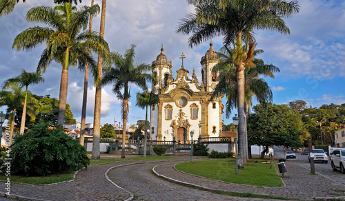 Baroque church and palm trees in Sao Joao del Rei, Brazil 