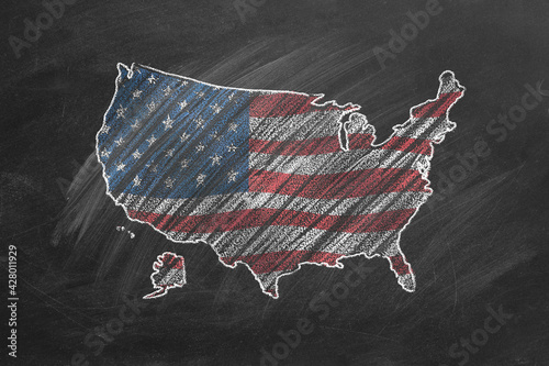 Country map and flag of the USA drawing with chalk on a blackboard.  One of a large series of maps and flags of different countries. Education, travel, study abroad concept.
