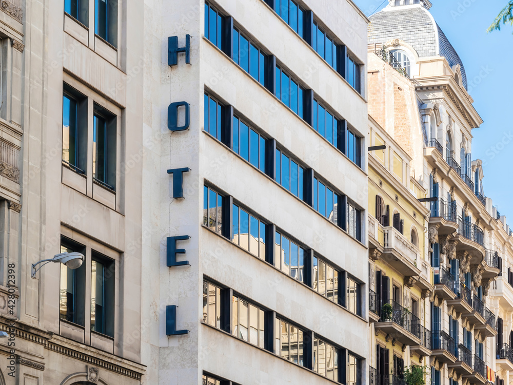 Obraz premium Vintage 70s building with Hotel lettering inscription signage in the Catalan capital Barcelona