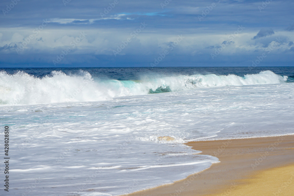 Waves crashing along Sunset Beach, Pupukea, North Shore, Oahu, Hawaii, USA