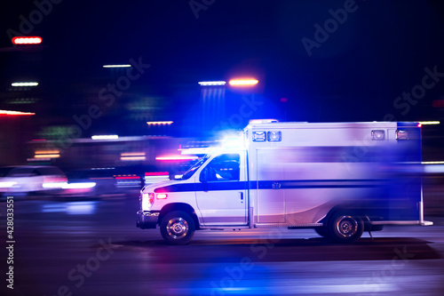 An ambulance races to respond to the scene of an emergency. photo