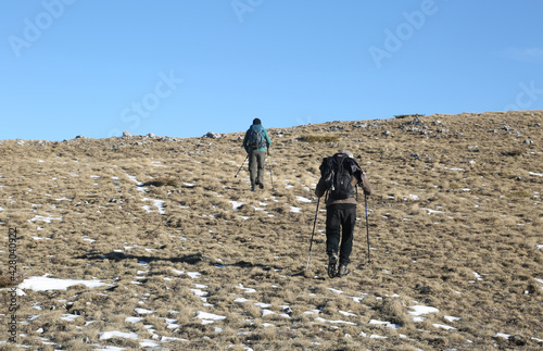 Mountaineers walking at Bistra Mountains in Mavrovo National Park, Macedonia. photo