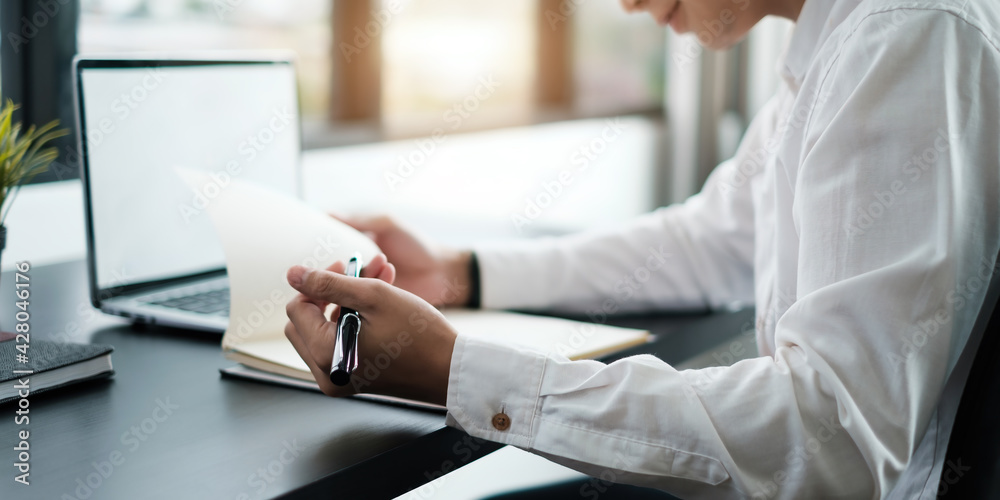 Fashion asian man designer using draft in paper before import to digital tablet. Fashion asian man designer using draft in paper before import to digital tablet.