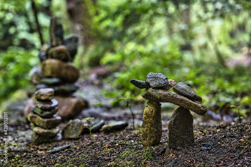 A small stone sculpture in a forest