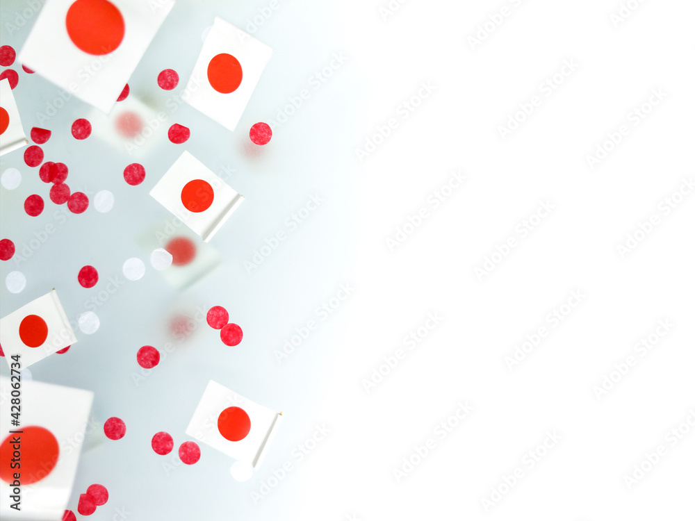 Japan, February 11. The foundation of the state, the nation, and the imperial dynasty. National flags on a foggy background, the concept of independence, memory, freedom. Political symbol 