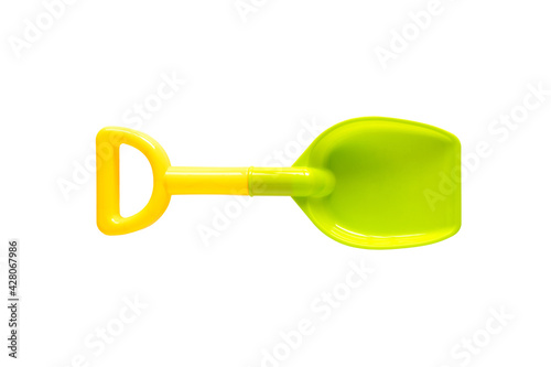 Plastic toy shovel isolated on a white background.
