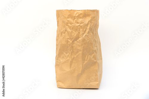 Brown recycle paper bag on white background.