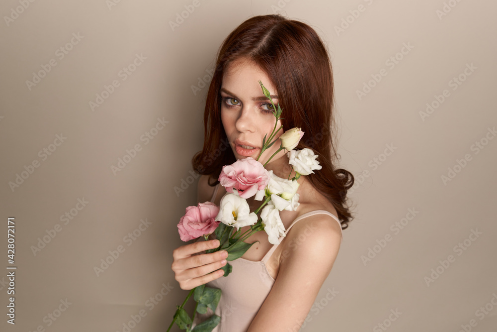 Elegant woman flowers charm and luxury beige background