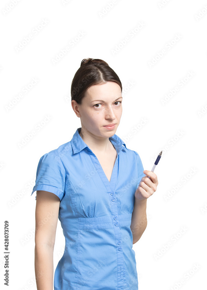 Portrait of young well-groomed women in blue strict office dress holding pen on white background. Self-presentation, teacher or secretary at work. Attentive look of person explaining information Portrait of young well-groomed women in blue strict office dress holding pen on white background. Self-presentation, teacher or secretary at work. Attentive look of person explaining information