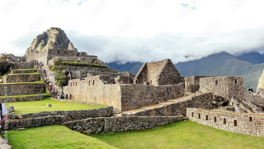 Machu Picchu: the ancient Inca city, located in the territory of modern Peru on top of a mountain.