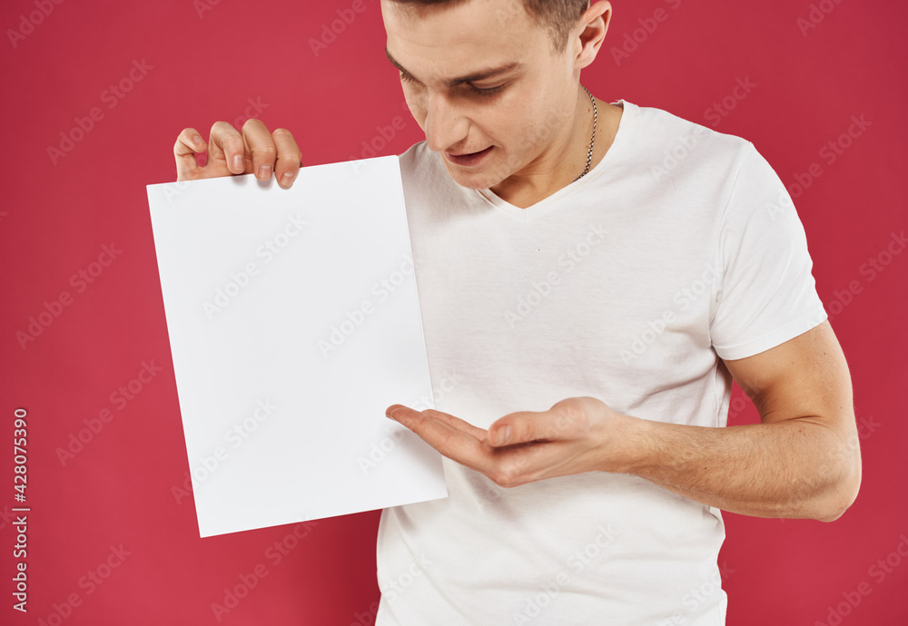 Joyful man on a red background with a white flag in his hand mock up poster Joyful man on a red background with a white flag in his hand mock up poster