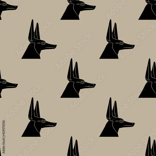 Seamless monochrome animal pattern with heads of ancient Egyptian jackal or canine headed god Anubis. 