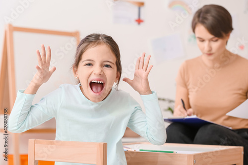 Screaming little girl durin...