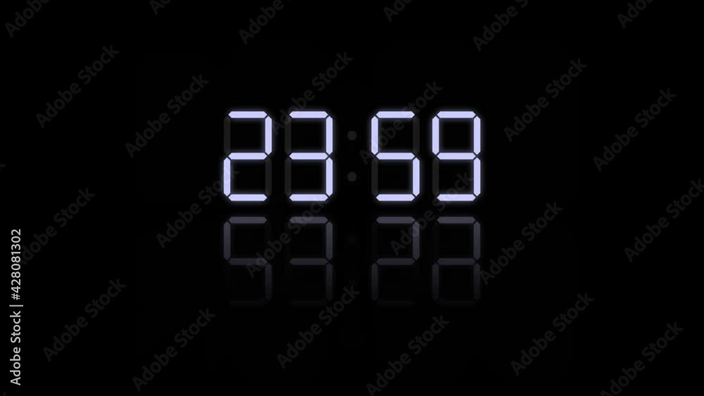 A beautiful glowing dial of an electronic clock shows the midnight time in darkness and zooms in with a bottom reflection A beautiful glowing dial of an electronic clock shows the midnight time in darkness and zooms in with a bottom reflection