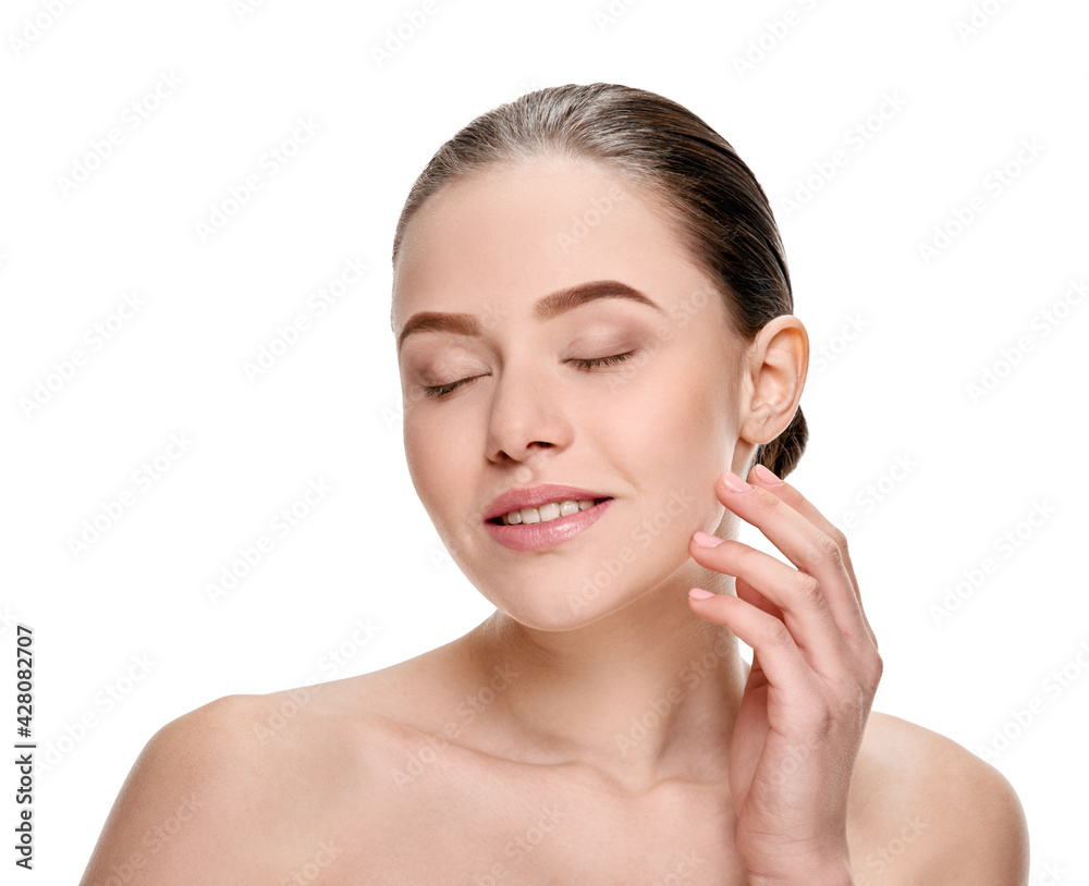 Beautiful natural girl with smooth skin and without makeup touching her face Beautiful natural girl with smooth skin and without makeup touching her face