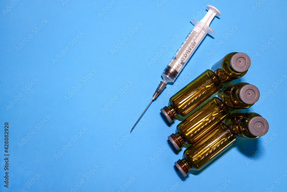 Used vials of drugs are on the table Used vials of drugs are on the table