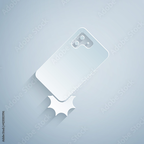 Paper cut Shockproof mobile phone icon isolated on grey background. Paper art style. Vector