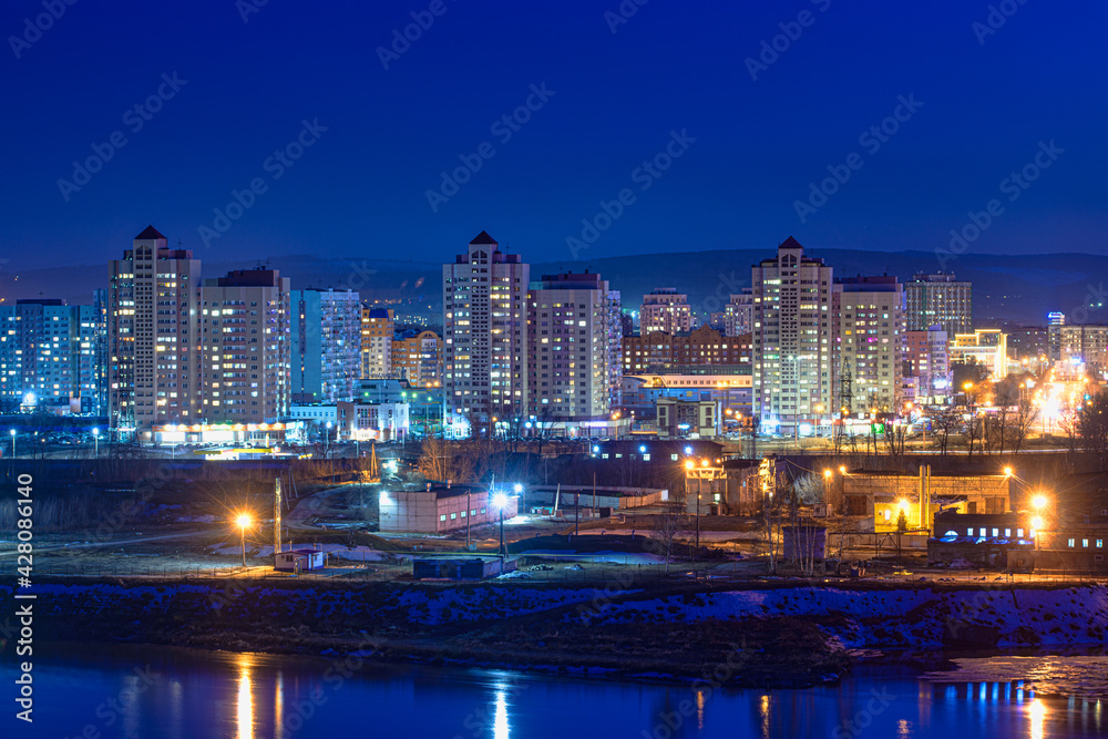 panoramic view of illuminated city at night 