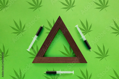 Cannabis Syringe Oil in a Triangle Shape