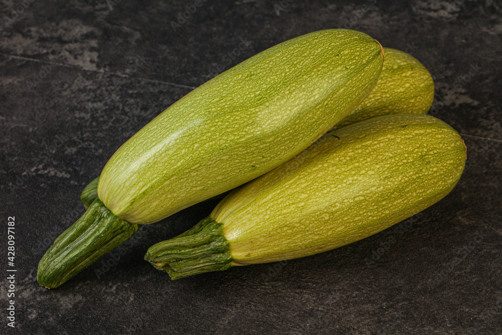 Young tasty zucchini over board Young tasty zucchini over board