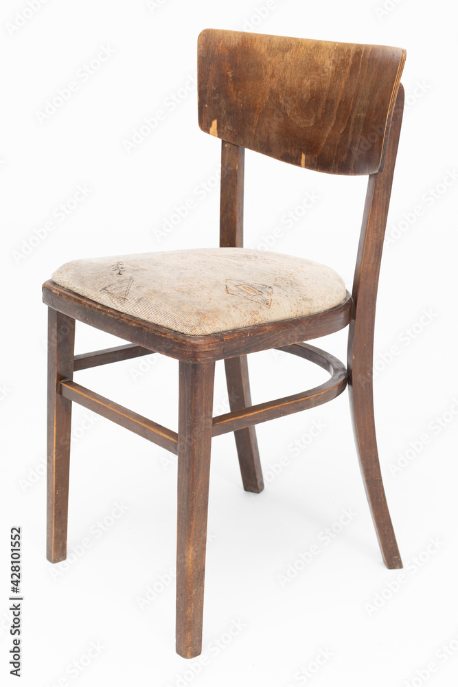 Wooden chair from turn of 70's and 80's from previous century with soft seat. Polish design and production. Front view Wooden chair from turn of 70's and 80's from previous century with soft seat. Polish design and production. Front view