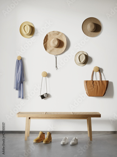 3d render of a Scandinavian design hallway with hats, bag a camera, a bench and sneaker shoes on a white wall photo