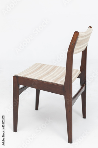 Wooden chair from turn of 70 s and 80 s from previous century with soft seat and back. Polish design and production. Rear view