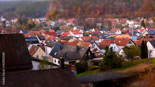 Old European town in Autumn. Cozy beautiful German village in Black Forest, cityscape with yellow trees.