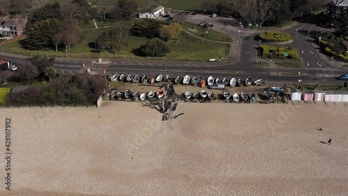 Aerial Footage of small fishing wooden fishing boats in boatyard on Aldwick Beach Bognor with West Park in View and the popular area of Aldwick. photo