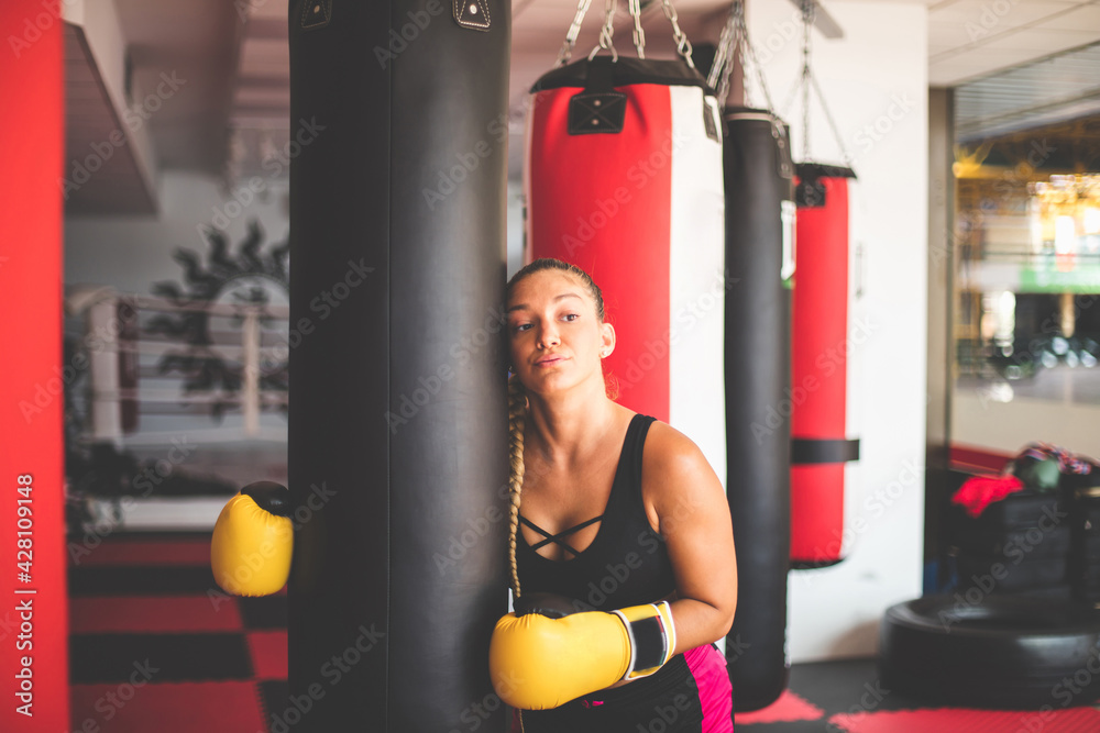 Woman in boxing gloves.