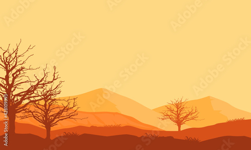 A dramatic silhouette of mountains and dry trees at dusk. Vector illustration