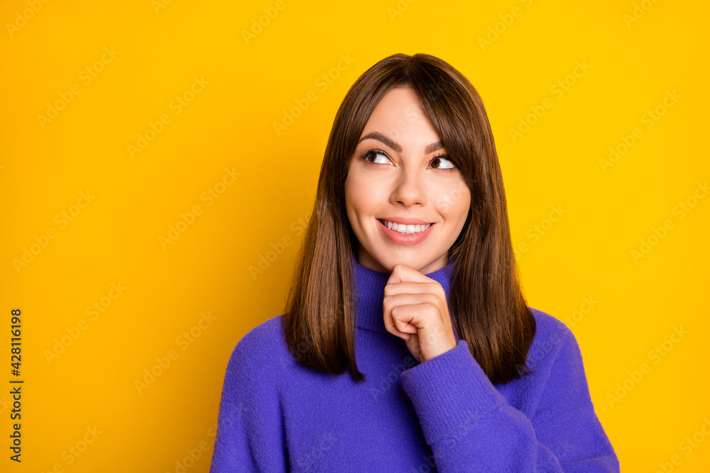 Portrait of attractive minded cheerful girl touching chin overthinking copy space isolated over bright yellow color background Portrait of attractive minded cheerful girl touching chin overthinking copy space isolated over bright yellow color background