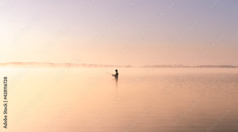 Fototapeta premium Fishing in the sunrise
