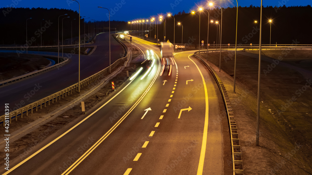 lights of moving cars at night. long exposure