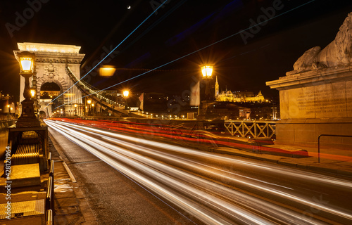 Chain bridge over Danube river at night © yorgen67