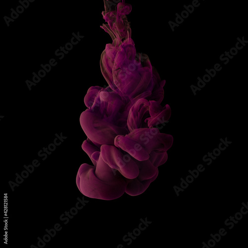 Explosion of colored, fluid and neoned liquids on black studio background with copyspace