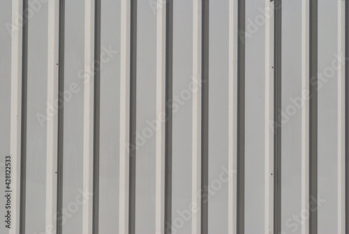 Close Up of Vertical Lines of Grey Corrugated Steel Wall