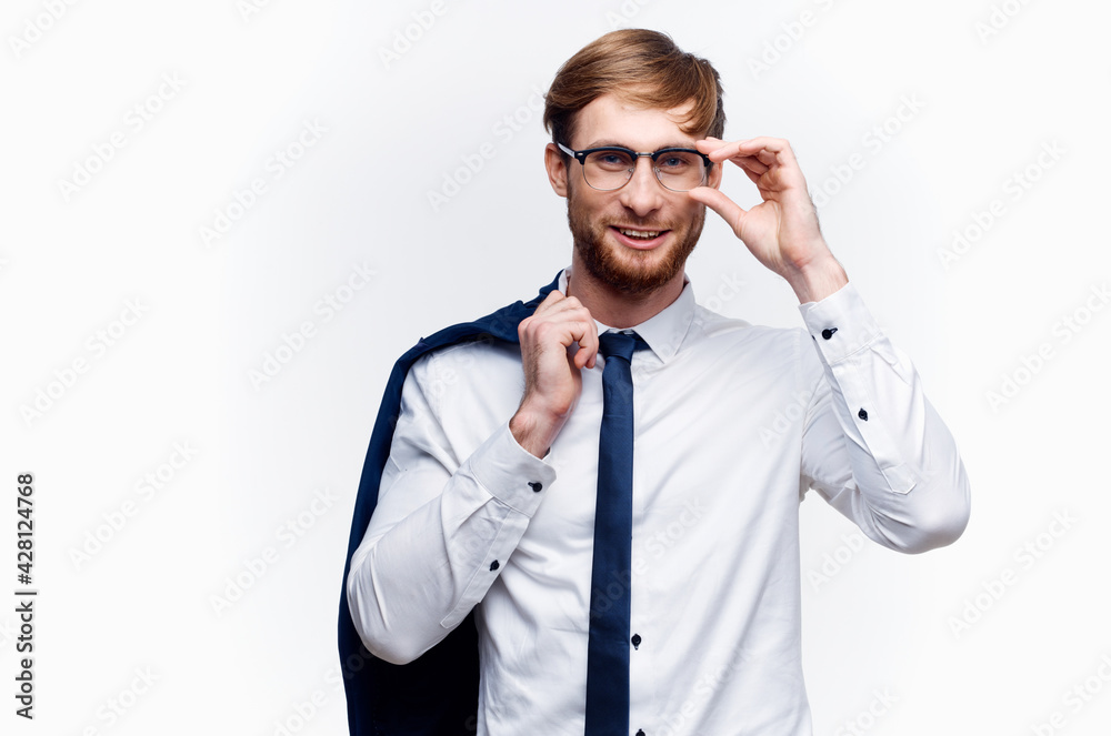 handsome blond businessman with jacket on shoulder and tie shirt model handsome blond businessman with jacket on shoulder and tie shirt model