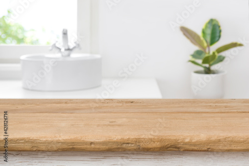 Papier peint Empty tabletop for product display on blurred bathroom interior background