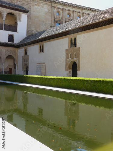 Granada (Spain). Pool of the Patio de los Arrayanes inside the Nasrid Palaces of the Alhambra in Granada photo