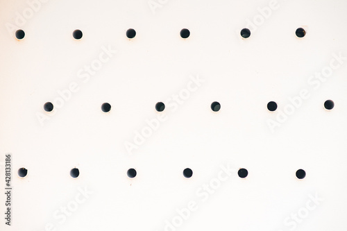 circular shape pattern with holes isolated on a white backgrond. photo