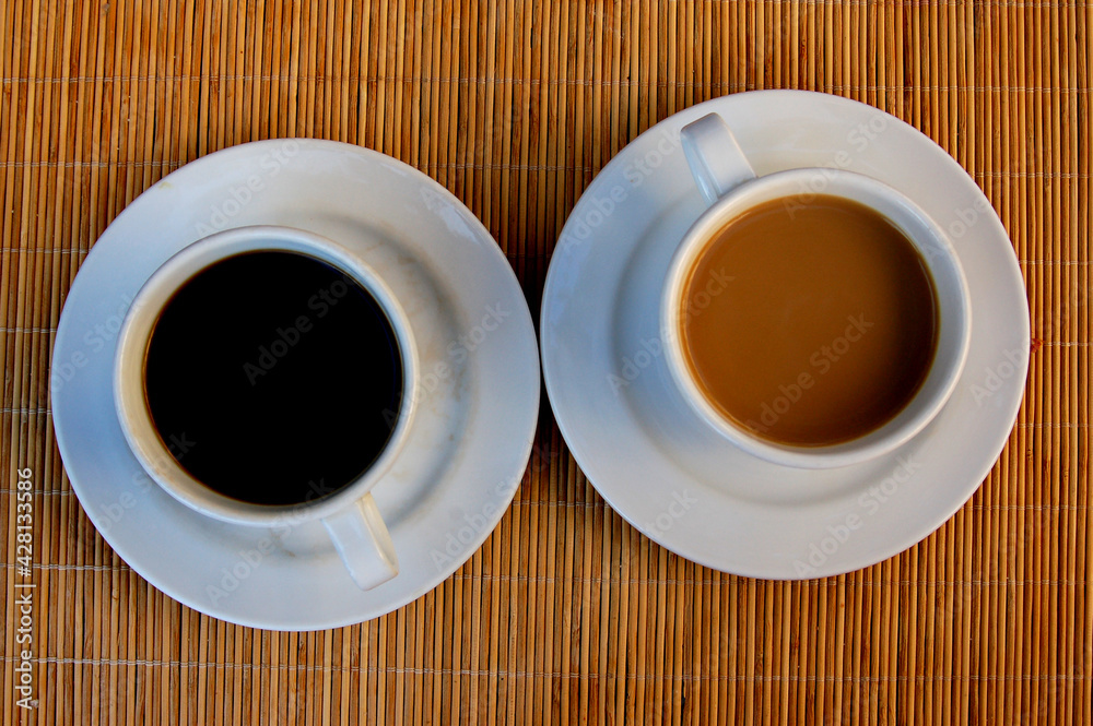 Obraz premium cup of coffee on wooden table