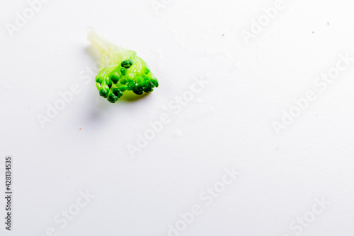 Still life macro: pastry, sweet potato, broccoli, garlic and cooked pork