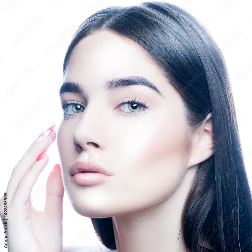 Beautiful young woman beauty face, hands near face, perfect skin, natural make-up, isolated on white background Beautiful young woman beauty face, hands near face, perfect skin, natural make-up, isolated on white background