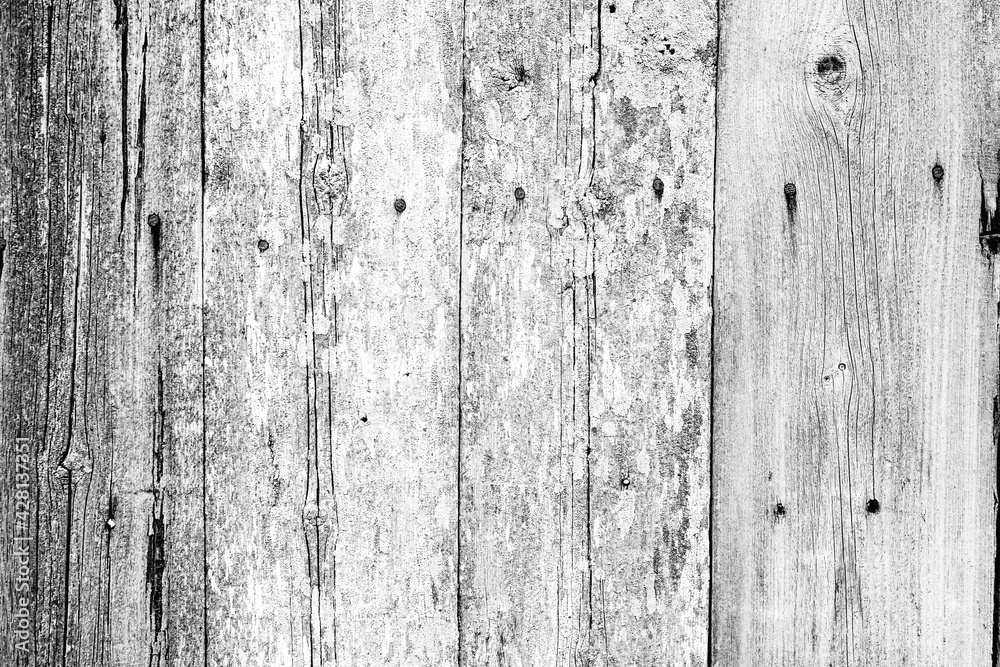 Naklejka premium Wooden texture with scratches and cracks. It can be used as a background
