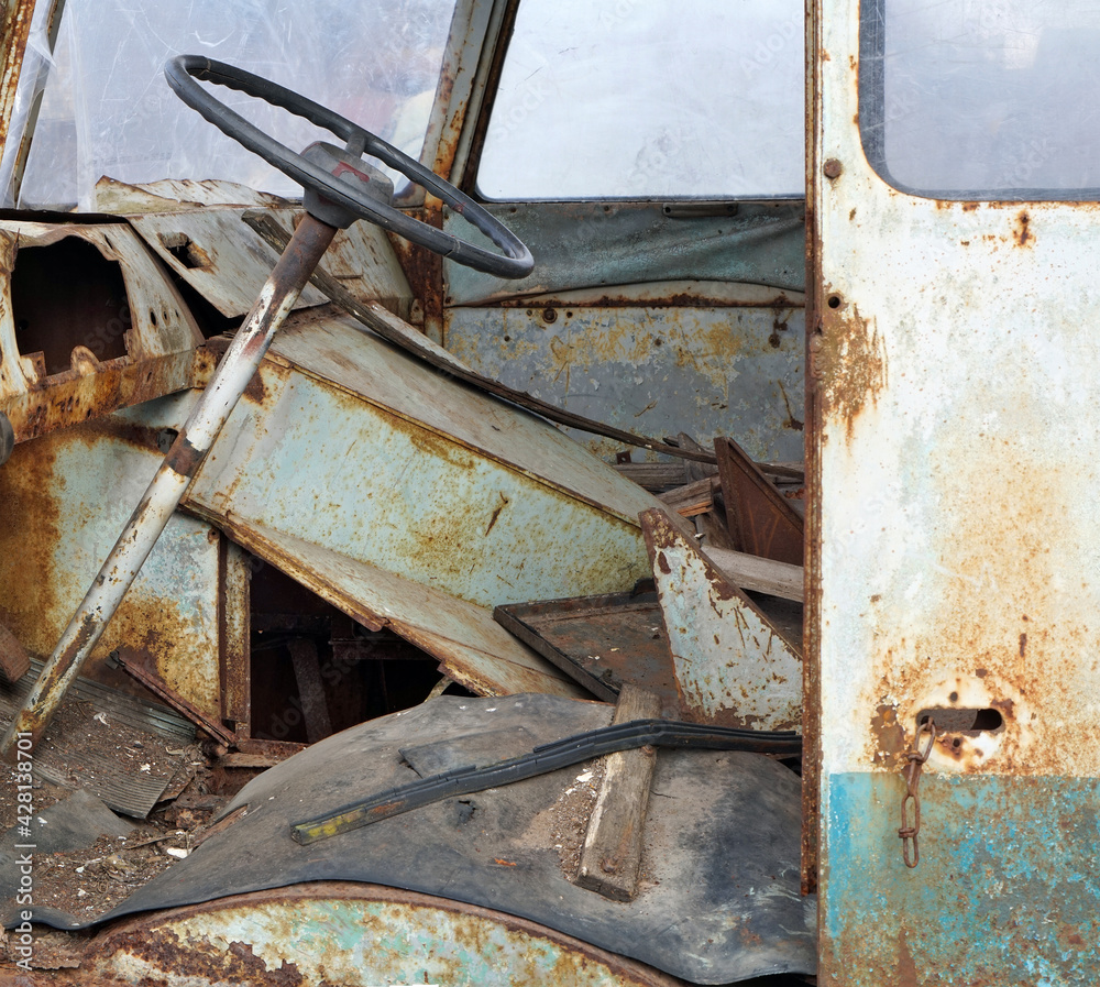 Inside the ruined cabin of an old broken bus