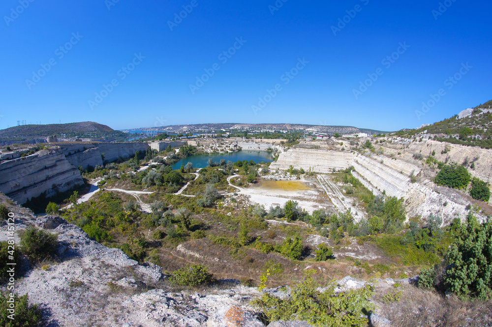 top view of the blue lake in the stone quarry, blue lake, flooded stone quarry